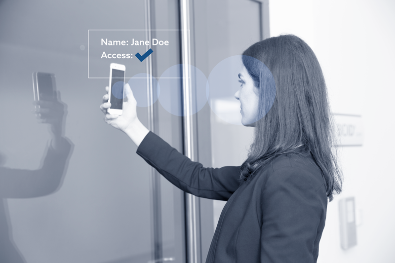 woman using access control with phone authentication