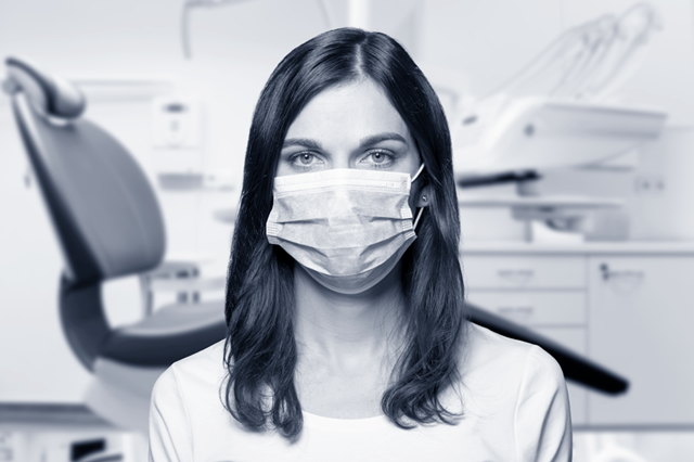 Woman doing face access control with mask in healthcare